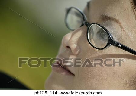 Young businesswoman wearing eye glasses View Large Photo Image Picture - Young businesswoman wearing eye glasses. Fotosearch
