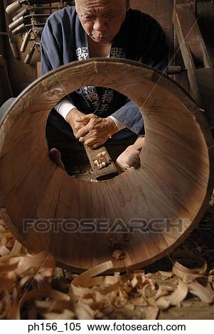 Carpenter planing a barrel View Large Photo Image Stock Photography - Carpenter planing a barrel. Fotosearch