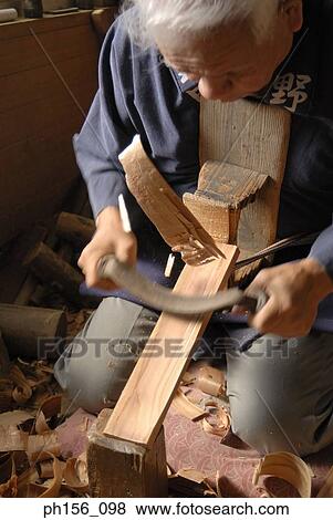 Carpenter working in a workshop View Large Photo Image Stock Photo - Carpenter working in a workshop. Fotosearch