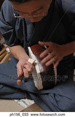 Close-up of a carpenter working with a chisel View Large Photo Image Stock Image - Close-up of a carpenter working with a chisel. Fotosearch