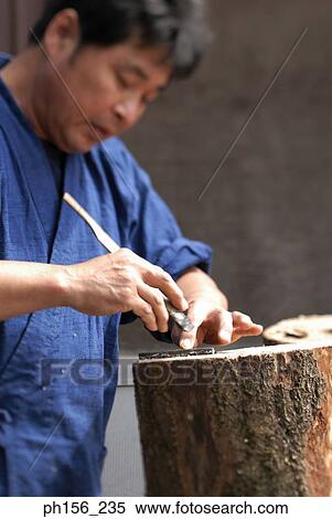 Side profile of a carpenter measuring a hand tool View Large Photo Image Stock Photography - Side profile of a carpenter measuring a hand tool. Fotosearch