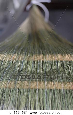 Close-up of threads on a loom View Large Photo Image Picture - Close-up of threads on a loom. Fotosearch