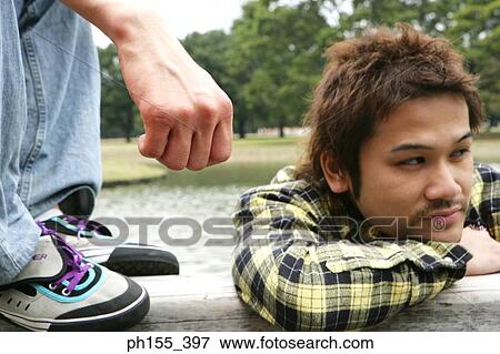 Close-up of a young man View Large Photo Image Stock Photo - Close-up of a young man. Fotosearch