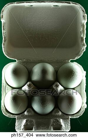 Six eggs in an egg crate, top view View Large Photo Image Picture - Six eggs in an egg crate, top view. Fotosearch