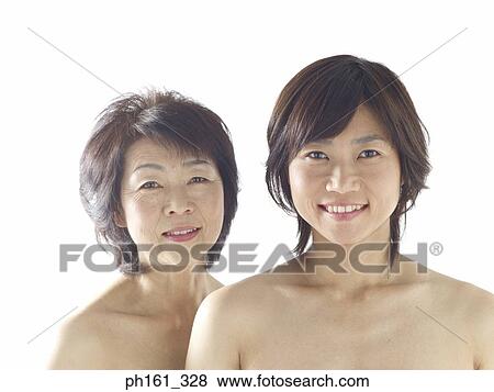 Stock Photo - A mature woman and young woman . Fotosearch