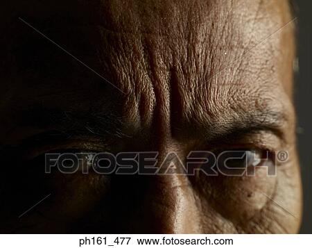 Close-up of a mature man View Large Photo Image Stock Photo - Close-up of a mature man. Fotosearch