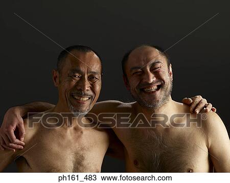 Two mature man hugging and smiling View Large Photo Image Stock Image - Two mature man hugging and smiling. Fotosearch