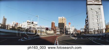 Stock Image - City roads with buildings. Fotosearch
