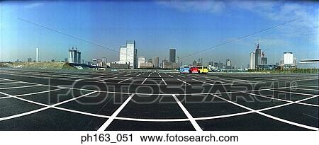 Parking lot with a view of the city View Large Photo Image Stock Image - Parking lot with a view of the city. Fotosearch