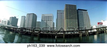Stock Photo - View of city and highway. Fotosearch