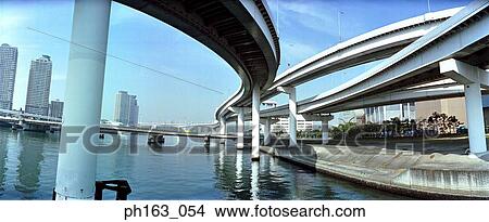 Picture - View of highway over a river. Fotosearch
