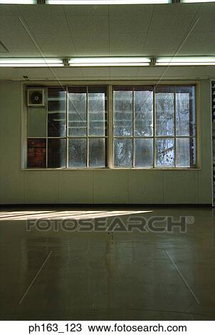 Stock Image - Empty room with windows. Fotosearch