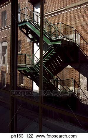 Stock Image - Staircase behind a building. Fotosearch