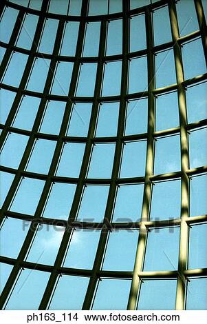 Picture - View of sky through a metal structure. Fotosearch