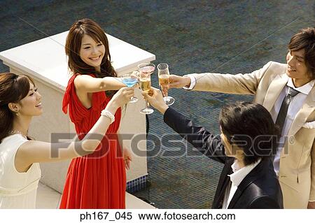 Two couples toasting, high angle View Large Photo Image Stock Photography - Two couples toasting, high angle. Fotosearch