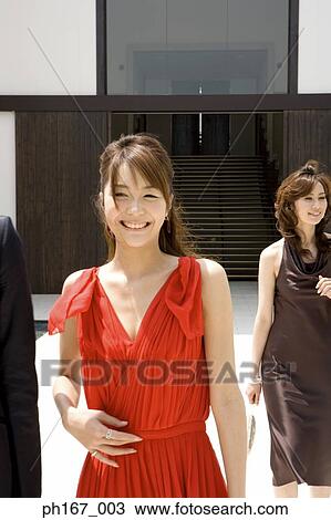 Two women in stylish clothes, walking View Large Photo Image Stock Image - Two women in stylish clothes, walking. Fotosearch