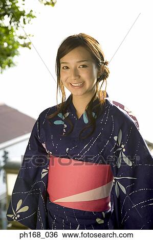 Woman in a kimono View Large Photo Image Stock Photograph - Woman in a kimono. Fotosearch