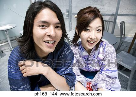Picture - Close-up of couple, smiling. Fotosearch