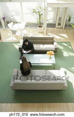 Discussion between businessman and businesswoman, close-up View Large Photo Image Stock Image - Discussion between businessman and businesswoman, close-up. Fotosearch