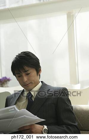 Businessman sitting down View Large Photo Image Stock Image - Businessman sitting down. Fotosearch