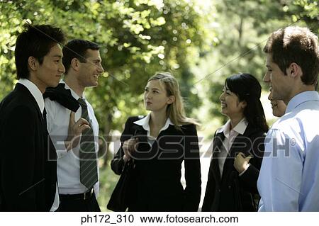 Group of business executives standing outdoor View Large Photo Image Stock Image - Group of business executives standing outdoor. Fotosearch