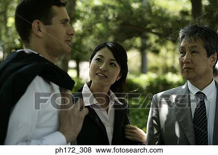 Group of business executives standing outdoor View Large Photo Image Stock Photo - Group of business executives standing outdoor. Fotosearch