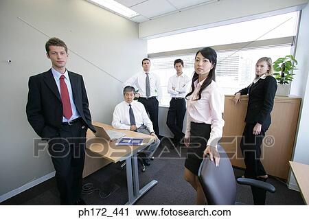 Group of executives in office View Large Photo Image Stock Image - Group of executives in office. Fotosearch