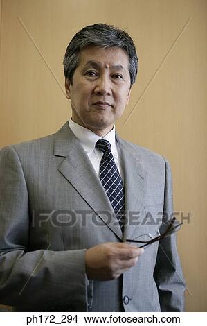 Portrait of mature businessman View Large Photo Image Picture - Portrait of mature businessman. Fotosearch