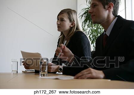 Two executives in a board room View Large Photo Image Stock Photo - Two executives in a board room. Fotosearch