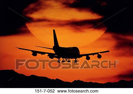 Day, Soaring, Clouds, Airplane, Land, Silhouette, Aircraft View Large Photo Image Stock Image - Day, Soaring, Clouds, Airplane, Land, Silhouette, Aircraft. Fotosearch