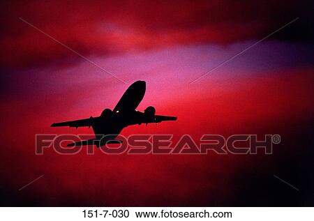 Stock Image - Transport, Aviation, Sunrise, Daylight, Transportation, Commercial, Airliner. Fotosearch