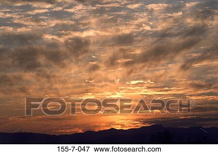 Stock Photo - , Cloud, Sunrise, Dramatic, Skies, Backgrounds, Sky. Fotosearch