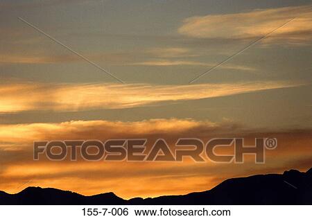 Clouds, Sunset, Sunrise, Backgrounds, Skies, Dramatic, Colorful View Large Photo Image Stock Photograph - Clouds, Sunset, Sunrise, Backgrounds, Skies, Dramatic, Colorful. Fotosearch