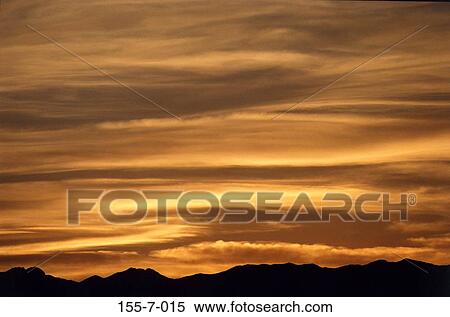 Stock Photography - Sunset, Cloud, Clouds, Sunrise, Skies, Dramatic, Colorful. Fotosearch