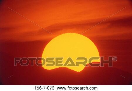 Stock Image - Background, Dawn, Sun, rising, Cloud, Skies, Sun. Fotosearch