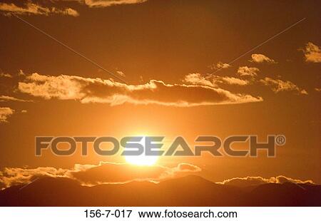 Stock Photo - Sky, Skies, Warmth, Background, Set, Setting, Daybreak. Fotosearch