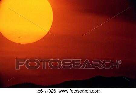 Stock Photograph - Summer, Backgrounds, Solstice, Setting, Time, Daybreak, Skies. Fotosearch