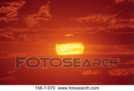 Sun, Skies, Clouds, Setting, Sunset, Warmth, Dawn View Large Photo Image Stock Image - Sun, Skies, Clouds, Setting, Sunset, Warmth, Dawn. Fotosearch