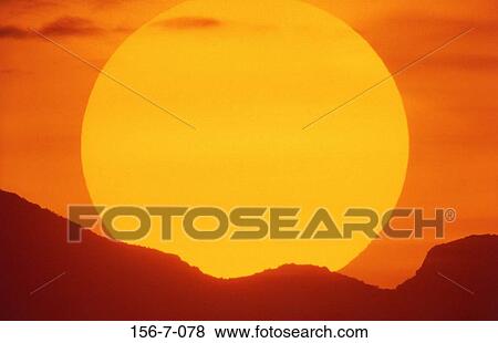 Stock Photo - Sunset, rising, Sun, Clouds, Setting, Set, Heaven. Fotosearch
