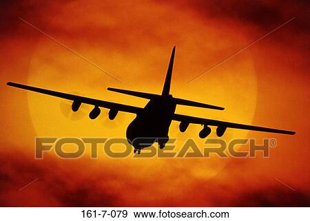 Planes, Outdoors, Clouds, C130, Silhouette, Day, Military View Large Photo Image Stock Photo - Planes, Outdoors, Clouds, C130, Silhouette, Day, Military. Fotosearch