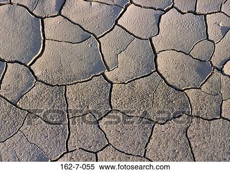 Stock Photography - Desert, Nature, Backgrounds, Grey, Earth, Dirt, Cracked. Fotosearch