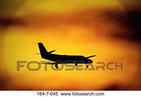 Silhouette, Aviation, Sunrise, Airplanes, Traveling, Business, Transport View Large Photo Image Stock Photography - Silhouette, Aviation, Sunrise, Airplanes, Traveling, Business, Transport. Fotosearch