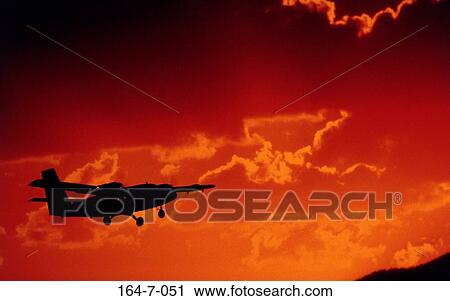 Silhouette, Traveling, Cloud, Soar, Day, Sunrise View Large Photo Image Stock Image - Silhouette, Traveling, Cloud, Soar, Day, Sunrise. Fotosearch