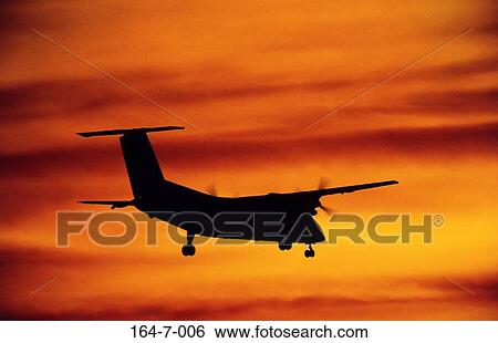 Sunrise, Silhouette, DeHavland, Clouds, Outside, Planes View Large Photo Image Stock Photograph - Sunrise, Silhouette, DeHavland, Clouds, Outside, Planes. Fotosearch