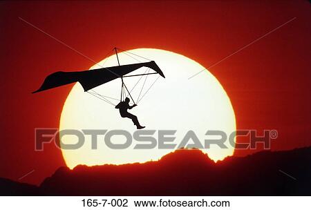 Flight, Sunrise, Recreational, Hanglider, Recreation, Thrilling, Adventure View Large Photo Image Stock Image - Flight, Sunrise, Recreational, Hanglider, Recreation, Thrilling, Adventure. Fotosearch