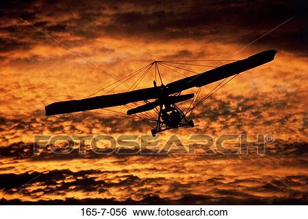 Recreation, Transportation, Aerial, Sunrise, Travel, Airplane, Adventure View Large Photo Image Stock Photograph - Recreation, Transportation, Aerial, Sunrise, Travel, Airplane, Adventure. Fotosearch