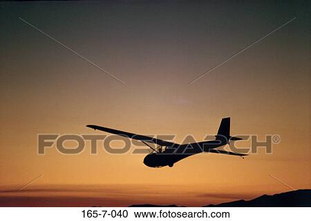 Recreational, Seeker, Soaring, Silhouette, Airplane, Daylight, Travelling View Large Photo Image Stock Image - Recreational, Seeker, Soaring, Silhouette, Airplane, Daylight, Travelling. Fotosearch