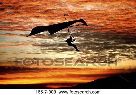 Stock Photo - Seeker, Hangliding, Daylight, Recreation, Sunset, Day, Recreational. Fotosearch