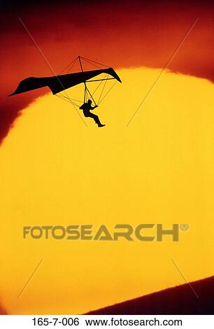 Thrill, Sunset, Landing, Thrilling, Silhouette, Aerial, Adventure View Large Photo Image Stock Photograph - Thrill, Sunset, Landing, Thrilling, Silhouette, Aerial, Adventure. Fotosearch