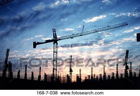 Construction, Outdoors, Sunset, Construction, Cranes, Industry, Day View Large Photo Image Stock Photo - Construction, Outdoors, Sunset, Construction, Cranes, Industry, Day. Fotosearch
